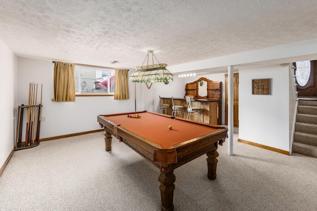 game room with a healthy amount of sunlight, baseboards, and carpet flooring