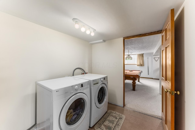 laundry room with laundry area, billiards, and independent washer and dryer