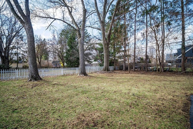 view of yard with fence