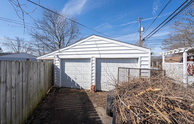 detached garage with fence