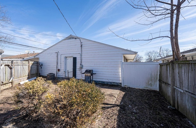 exterior space with a fenced backyard