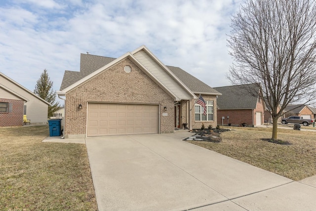 view of front of home featuring a garage, brick siding, concrete driveway, roof with shingles, and a front yard