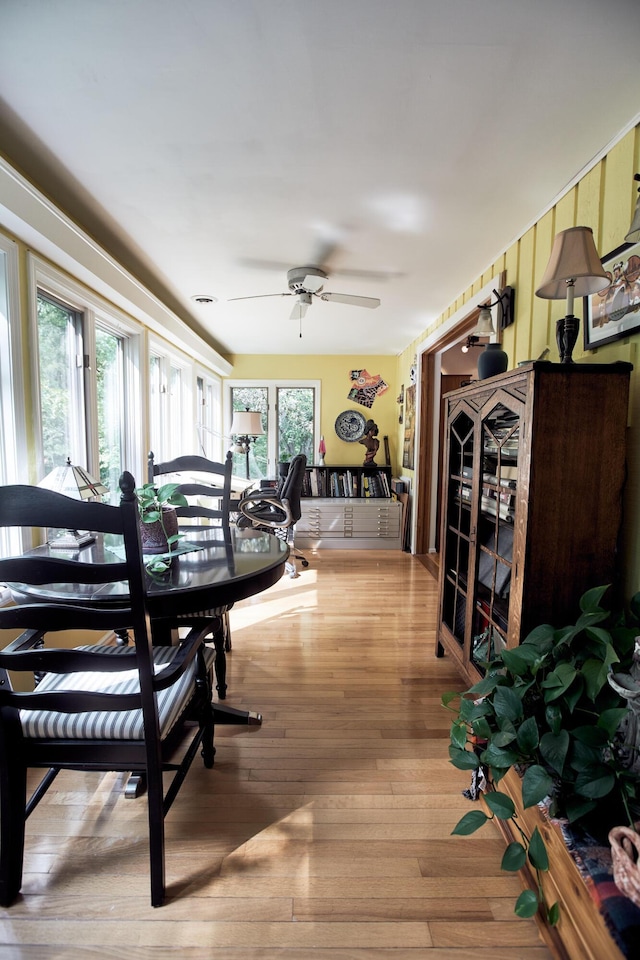 dining room featuring hardwood / wood-style flooring and ceiling fan