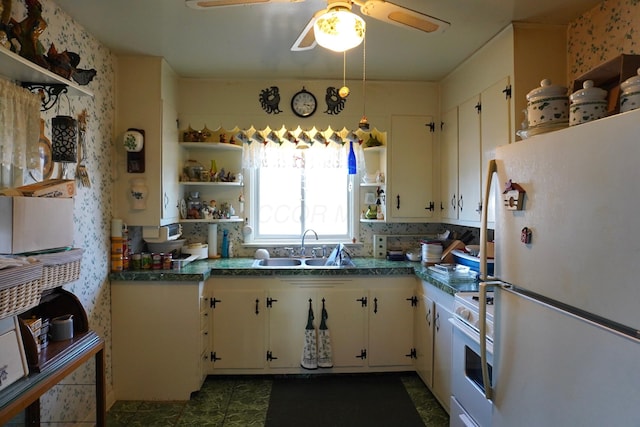 2930 County Road 184, Cardington, OH 43315 - kitchen with open shelves, white appliances, and dark countertops