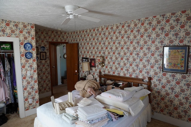 2930 County Road 184, Cardington, OH 43315 - bedroom with light carpet, a textured ceiling, baseboards, and wallpapered walls