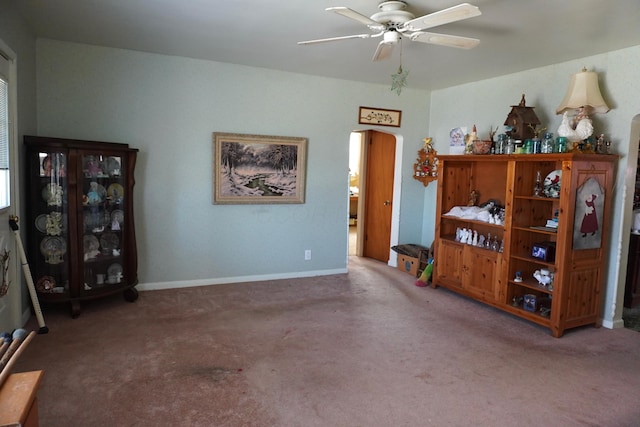 2930 County Road 184, Cardington, OH 43315 - interior space featuring baseboards, carpet, arched walkways, and a ceiling fan