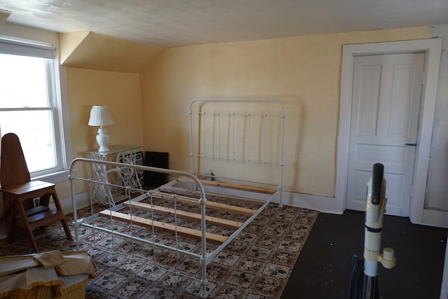 2930 County Road 184, Cardington, OH 43315 - bedroom with lofted ceiling, multiple windows, and baseboards