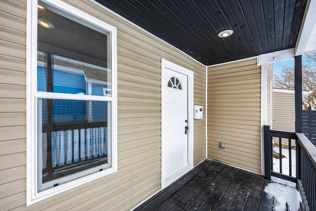 entrance to property with a balcony