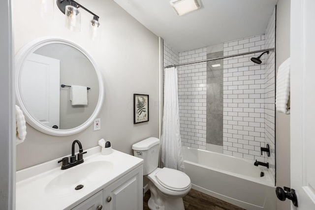 bathroom with toilet, visible vents, shower / bath combination with curtain, and vanity