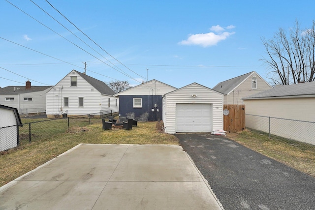 exterior space featuring fence and driveway