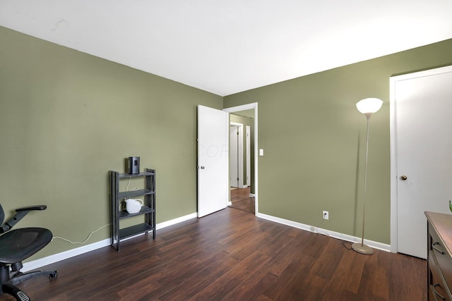 office with wood finished floors and baseboards