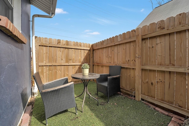 view of patio with fence