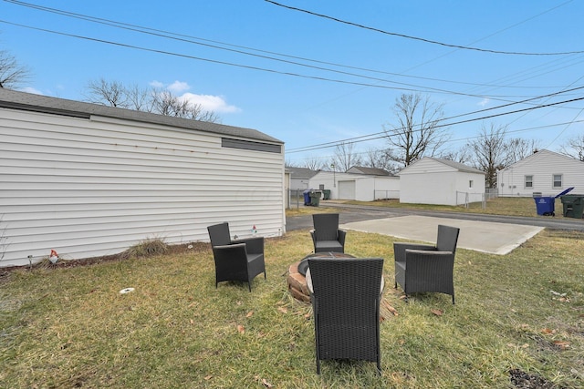 view of yard with a detached garage