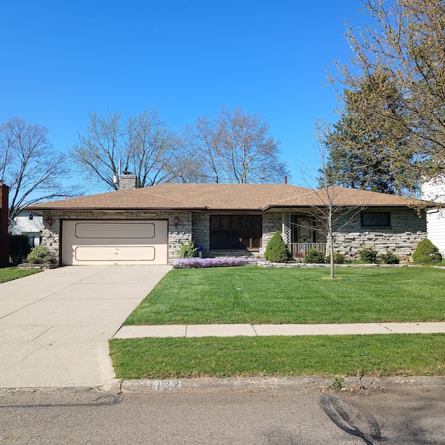 ranch-style house featuring a garage, a front yard, stone siding, and a chimney