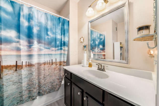 full bathroom with shower / bath combination with curtain and vanity