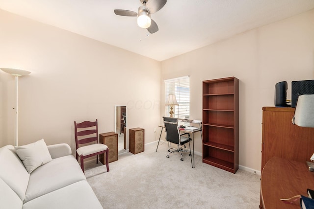 office space featuring baseboards, a ceiling fan, and carpet flooring