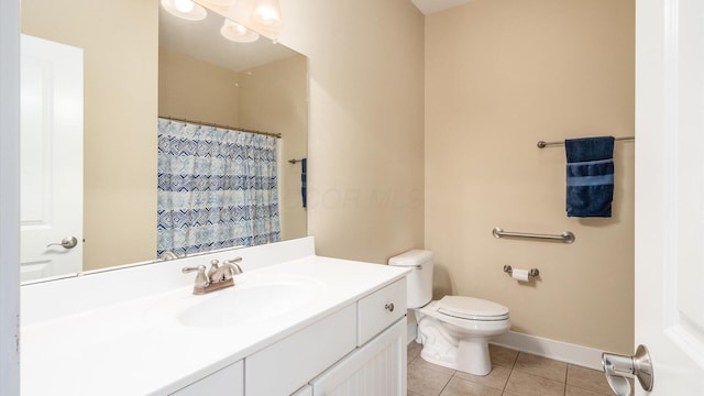 full bathroom with baseboards, a shower with shower curtain, toilet, tile patterned floors, and vanity