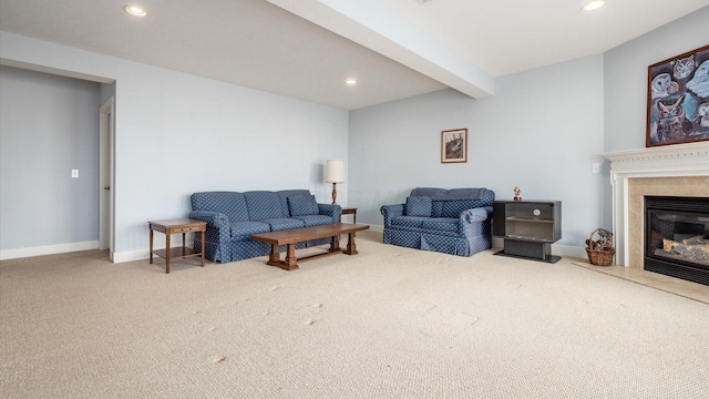 living area featuring recessed lighting, a fireplace, beam ceiling, and carpet flooring