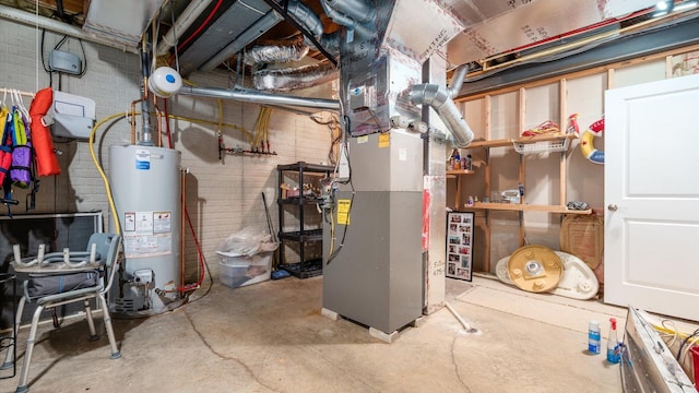 utility room with water heater and heating unit