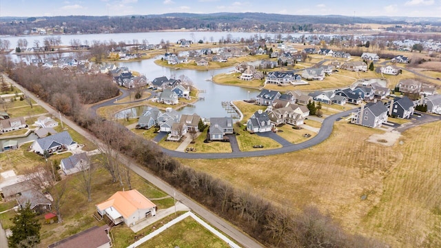 aerial view featuring a water view and a residential view