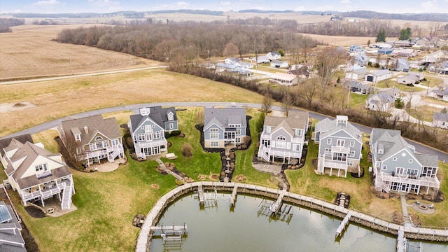 aerial view featuring a water view and a residential view