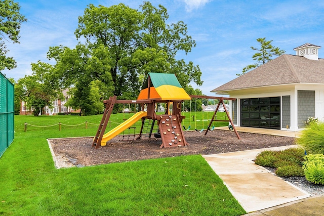 community playground featuring a yard