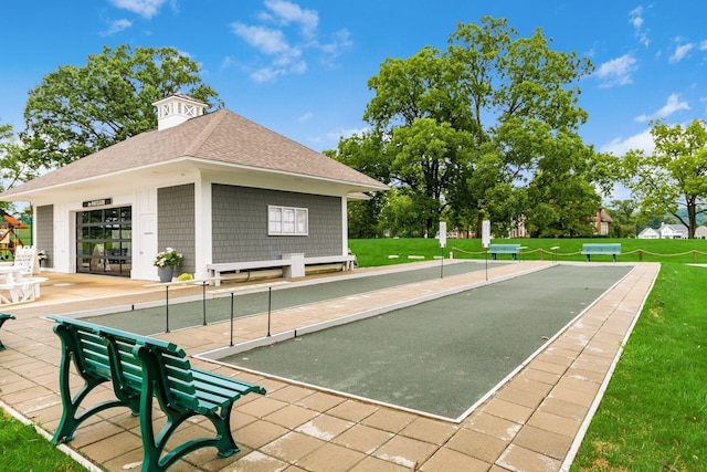 view of home's community featuring a lawn