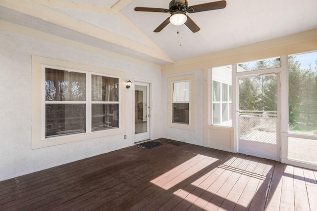 unfurnished sunroom featuring vaulted ceiling and ceiling fan