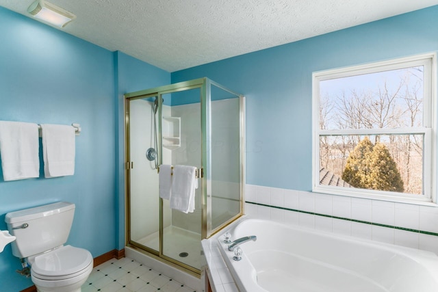 bathroom featuring toilet, a textured ceiling, a shower stall, and a bath