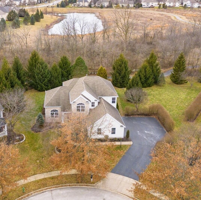 aerial view with a water view and a residential view