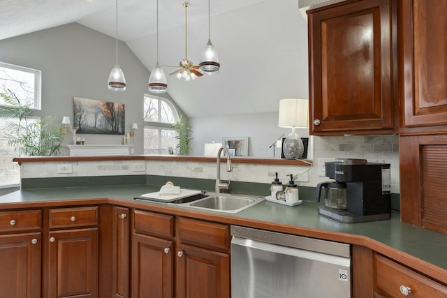 kitchen with ceiling fan, a sink, vaulted ceiling, decorative backsplash, and dishwasher