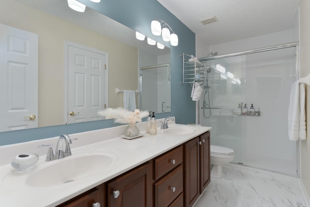 full bathroom featuring marble finish floor, a shower stall, visible vents, and a sink