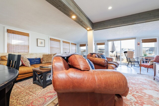 127 Brads Way, Russells Point, OH 43348 - living room with recessed lighting, plenty of natural light, and beamed ceiling