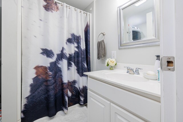 127 Brads Way, Russells Point, OH 43348 - bathroom with curtained shower and vanity
