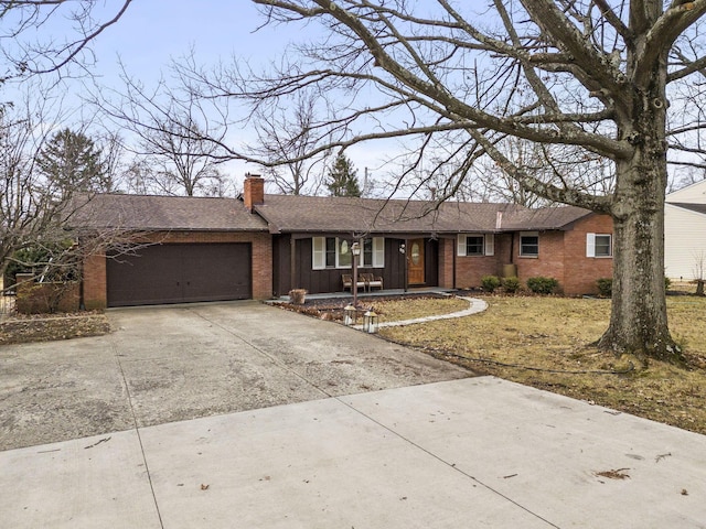 ranch-style house featuring a garage, brick siding, driveway, roof with shingles, and a chimney