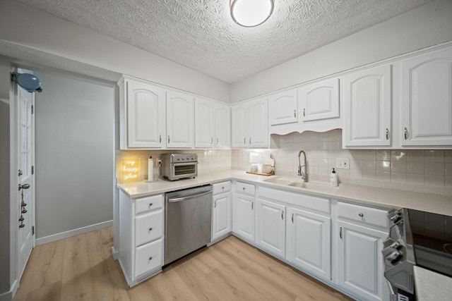 kitchen with light wood-style flooring, stainless steel dishwasher, white cabinetry, a sink, and range with electric stovetop