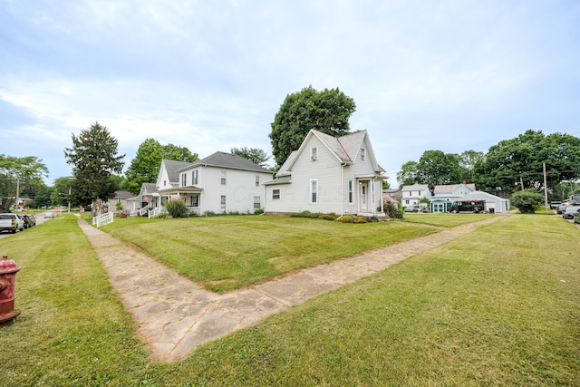 409 High St, Utica, OH 43080 - view of property exterior featuring a lawn