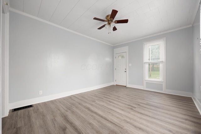 409 High St, Utica, OH 43080 - empty room with wood finished floors, ornamental molding, and a ceiling fan