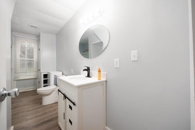 409 High St, Utica, OH 43080 - bathroom featuring vanity and wood finished floors