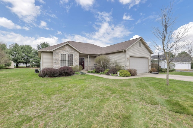 single story home with an attached garage, stone siding, a front lawn, and concrete driveway