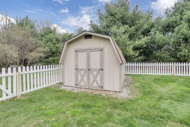 view of shed featuring a fenced backyard