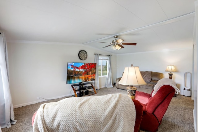 carpeted bedroom with baseboards, vaulted ceiling, and crown molding