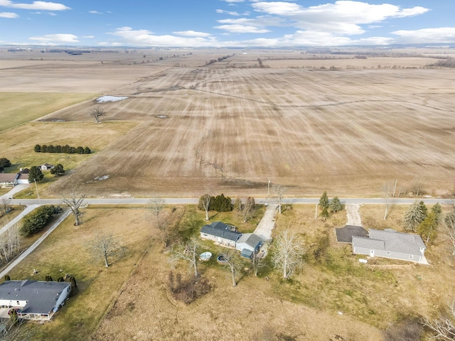 birds eye view of property featuring a rural view