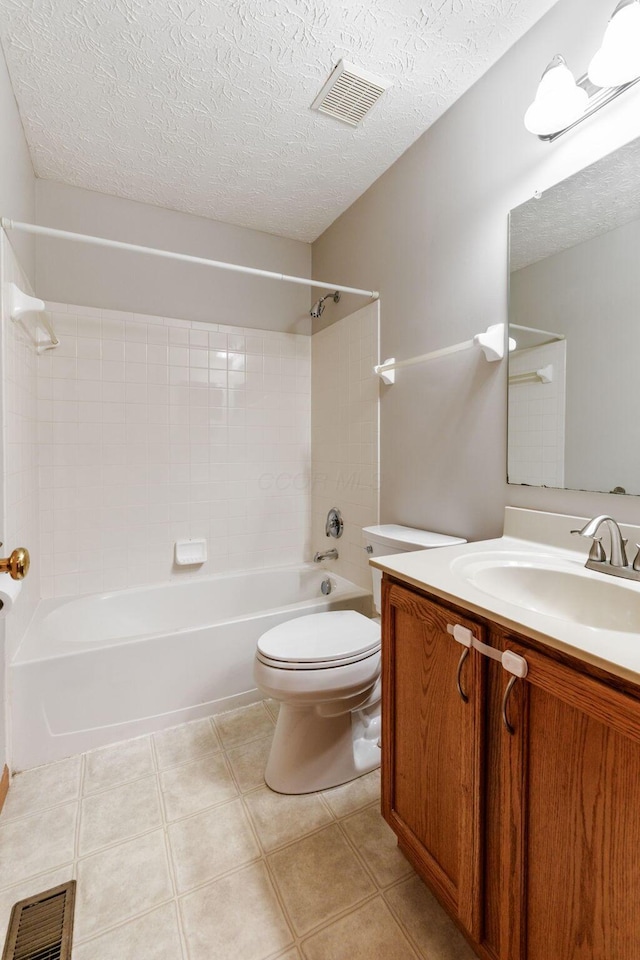 full bath with visible vents, bathing tub / shower combination, toilet, and vanity