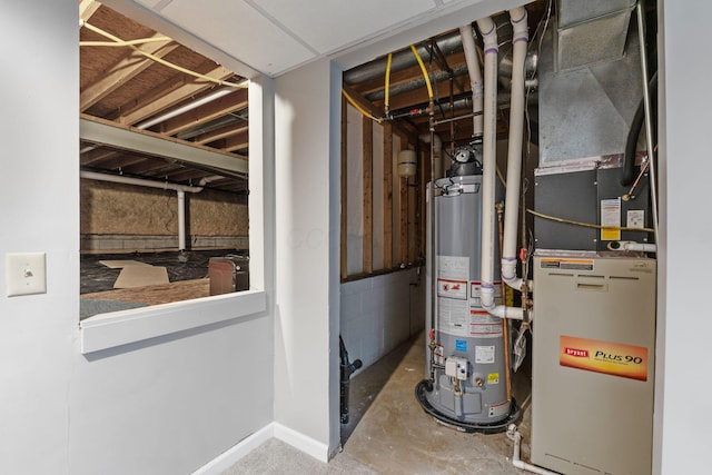 utility room featuring water heater and heating unit