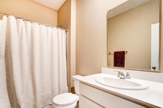 full bath with toilet, shower / tub combo, and vanity