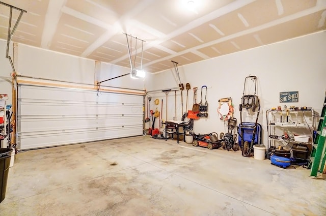 garage featuring a garage door opener