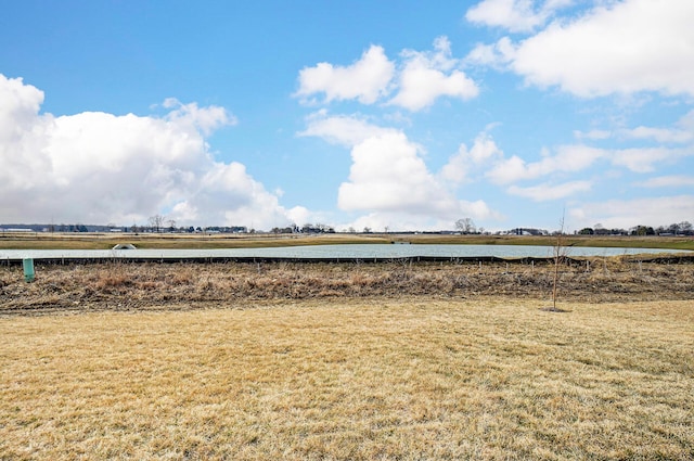 view of yard with a water view