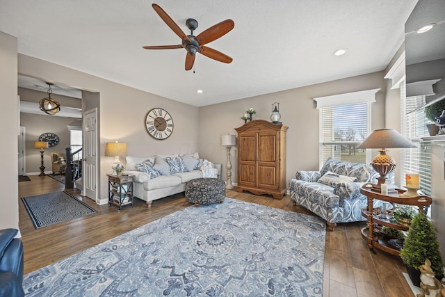 living room with ceiling fan, baseboards, wood finished floors, and recessed lighting