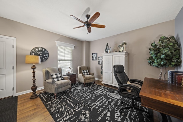 office with ceiling fan, baseboards, and wood finished floors